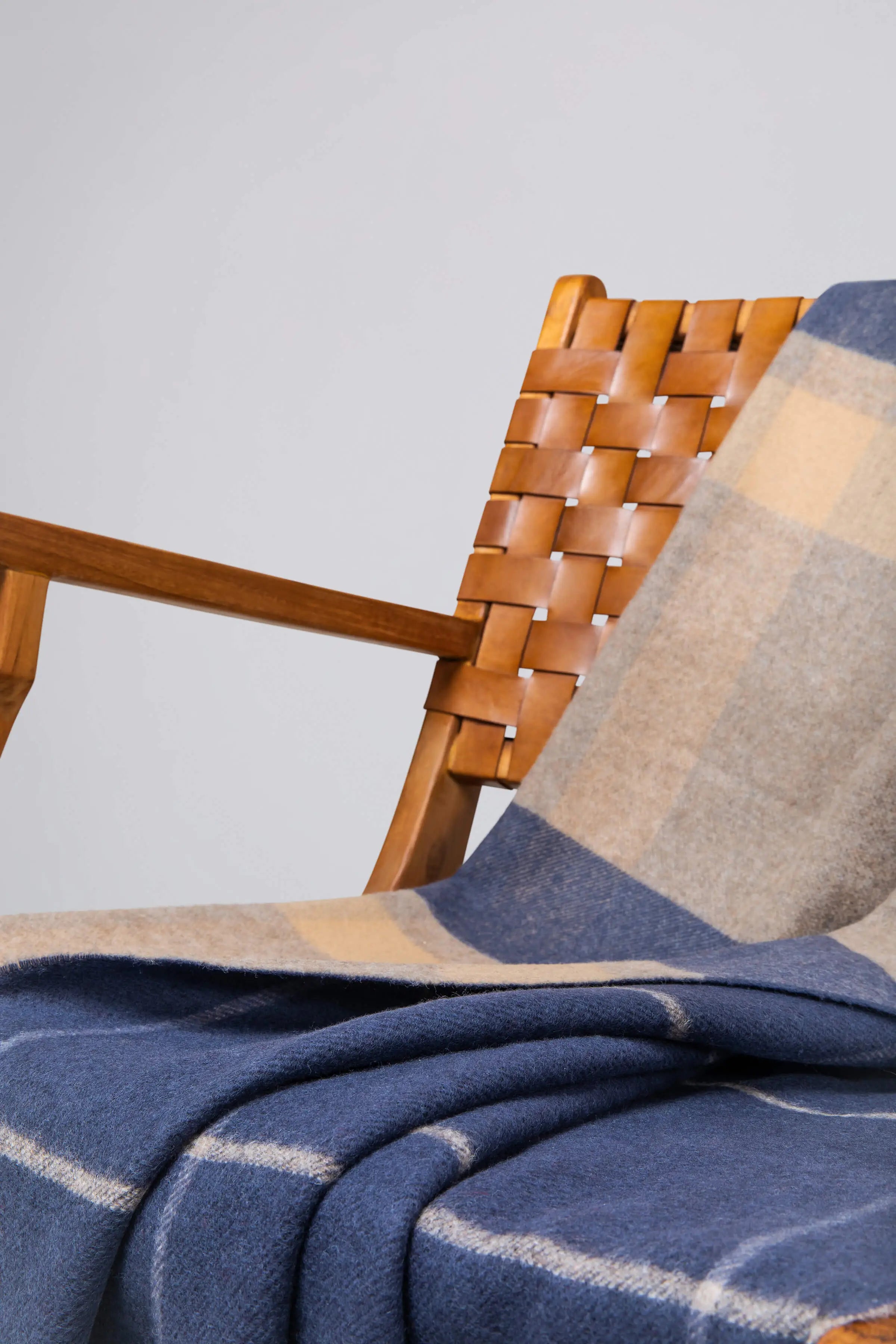 Double Face Lambswool Throw in Brown & Navy Overcheck